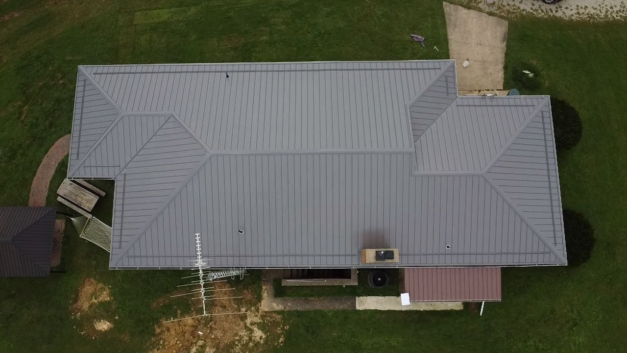 Light gray metal roof on a single-story home